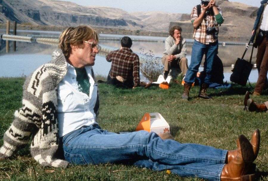 Robert Redford relaxing on a field trip with his graduate students. Cary Jones, who was on the trip, contended that the star was happiest in blue jeans and the outdoors.