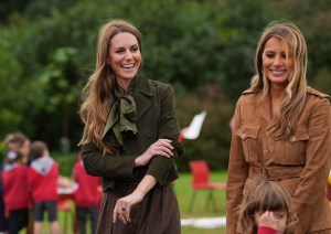WINDSOR, ENGLAND - SEPTEMBER 18: U.S. First Lady Melania Trump (R) and Catherine, Princess of Wales (L) meet members of the Scouts' Squirrels programme as they tour the grounds of Frogmore Cottage, during the State visit by the President of the United States of America and U.S. First Lady Melania Trump, on September 18, 2025 in Windsor, England. (Photo by Yui Mok - WPA Pool/Getty Images)