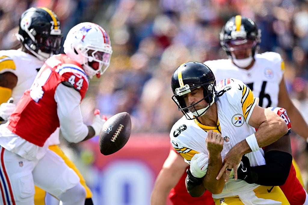 FOXBOROUGH, MASSACHUSETTS - SEPTEMBER 21: Aaron Rodgers #8 of the Pittsburgh Steelers is sacked by Milton Williams #97 of the New England Patriots during the first half at Gillette Stadium on September 21, 2025 in Foxborough, Massachusetts. (Photo by Jaiden Tripi/Getty Images)