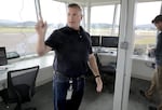 Aeostar Tillamook business manager, Kevin Tucker, inside the traffic control tower at Tillamook Airport. “The know-how that we have is how to take pieces, put them together, with very uniform loads and stresses, so that when they're under pressure, there's no failure points,” Tucker said. Aug. 4, 2025