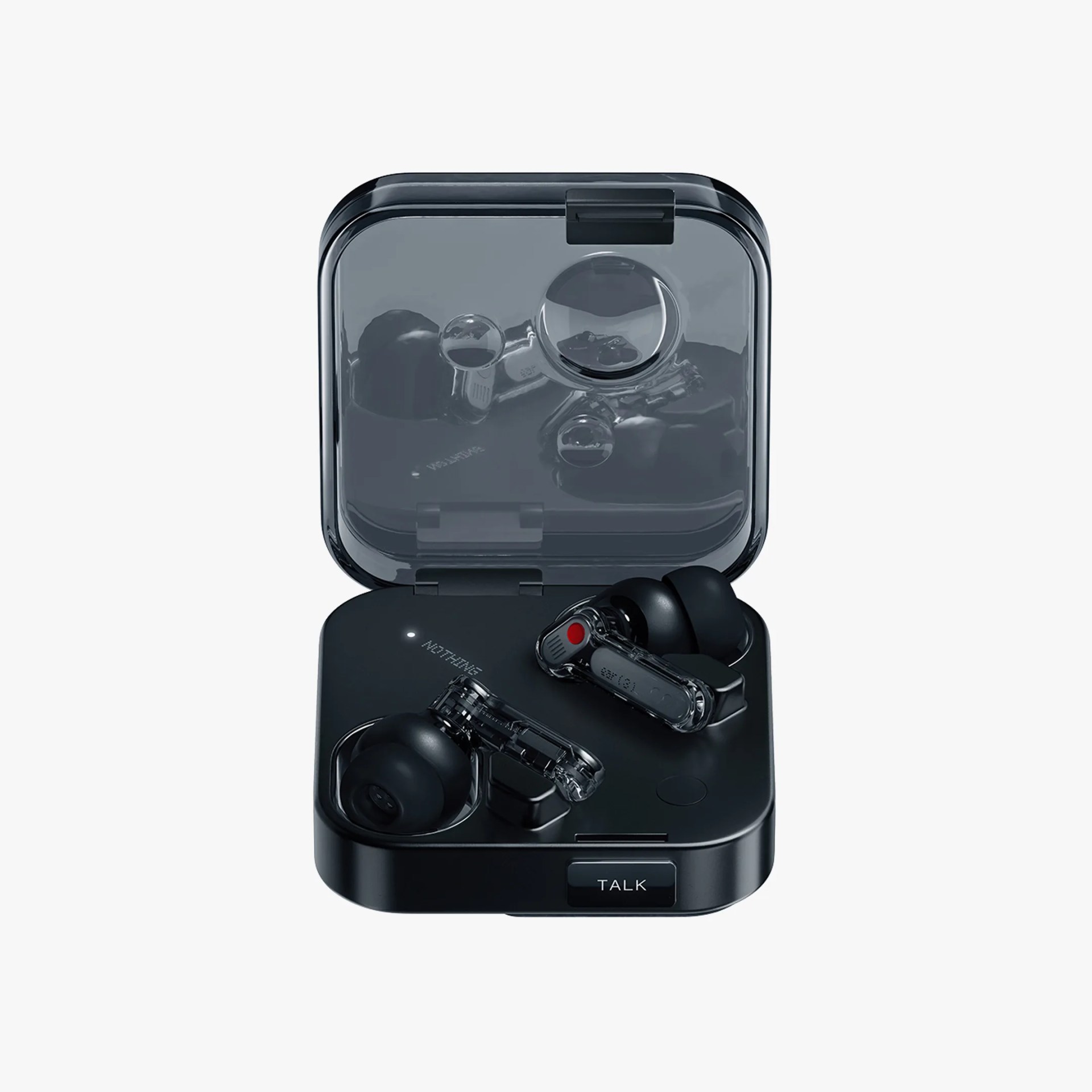 Black wireless earbuds with transparent stems inside a matching black charging case with a translucent lid. The case has a button labeled