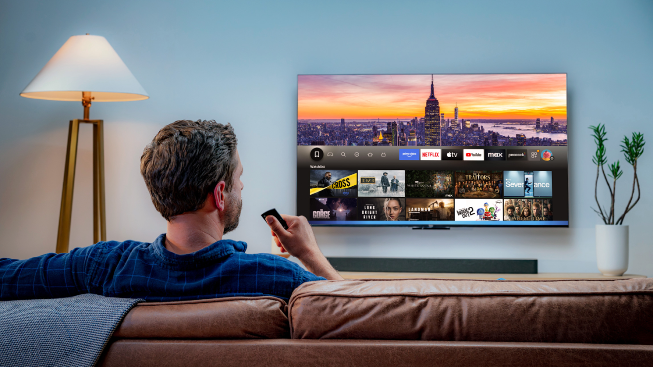 man talking into his fire tv remote