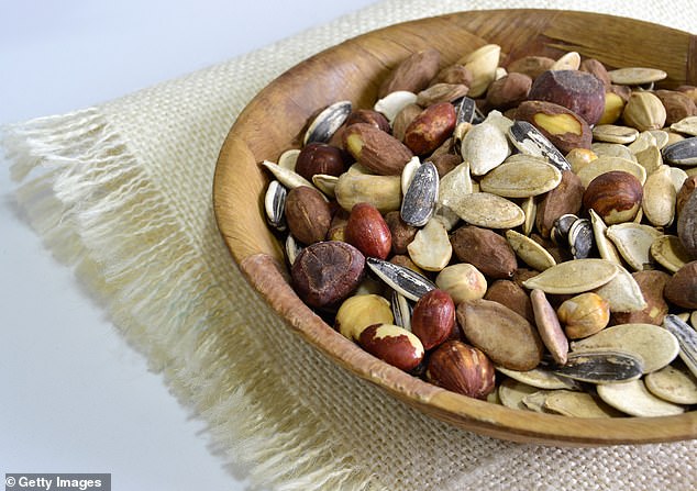 Unsalted nuts have been shown to lower dementia risk in older adults (stock image)