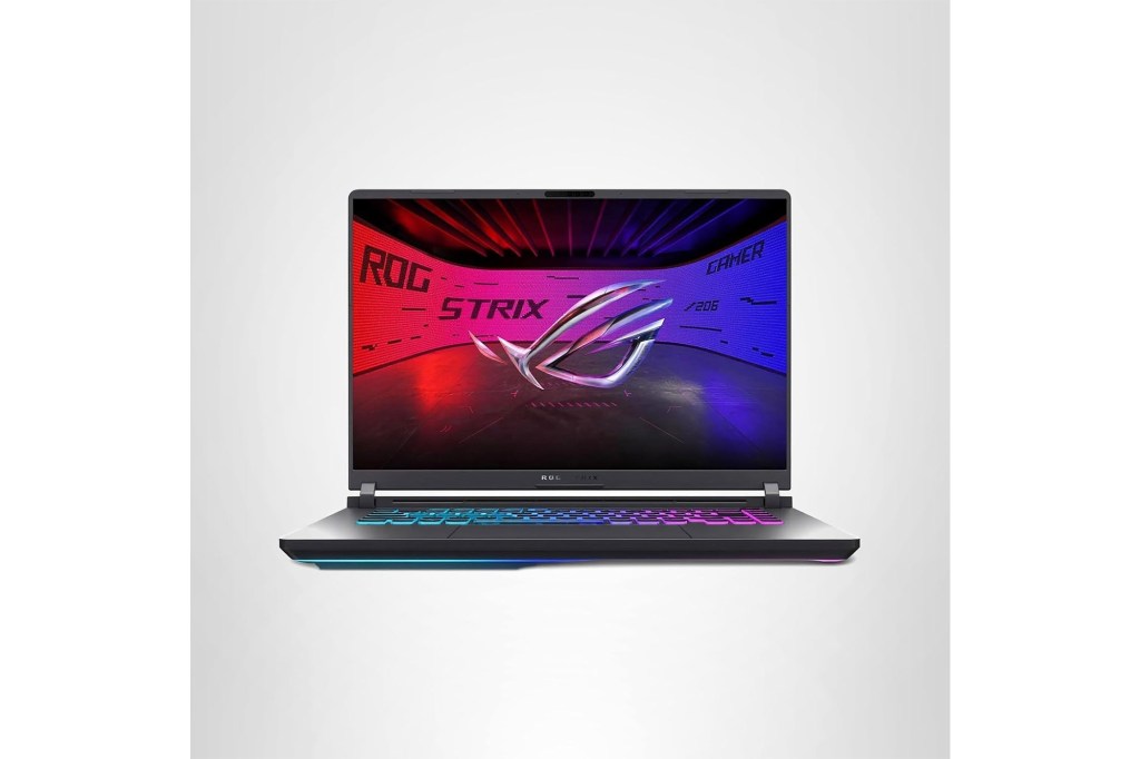 A black gaming laptop with a colorful keyboard and a screen displaying "ROG STRIX GAMER".
